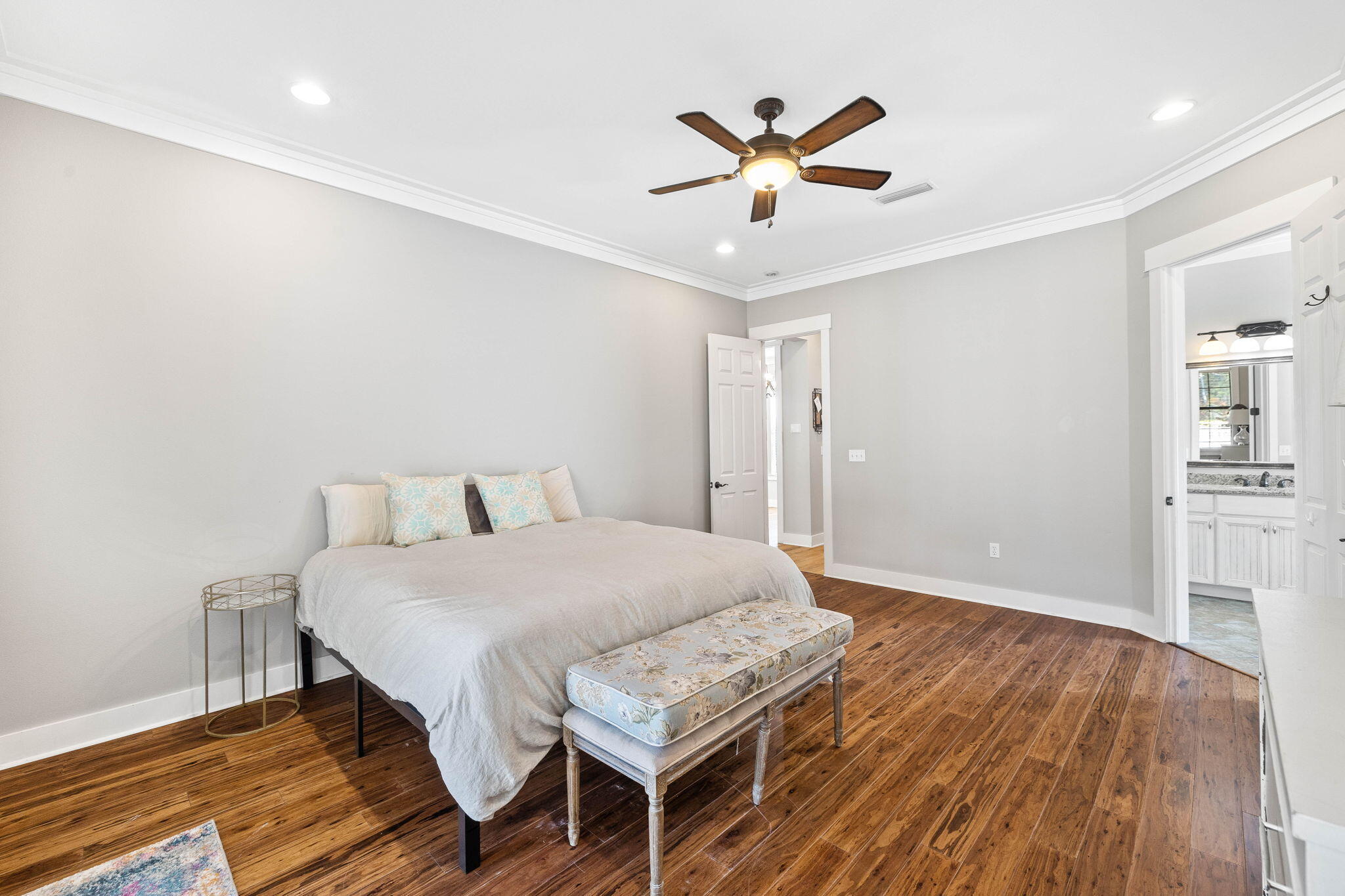 144 Preston Path Santa Rosa Beach, FL 32459 - Photo 43 of 60 a bedroom with a bed and a chandelier