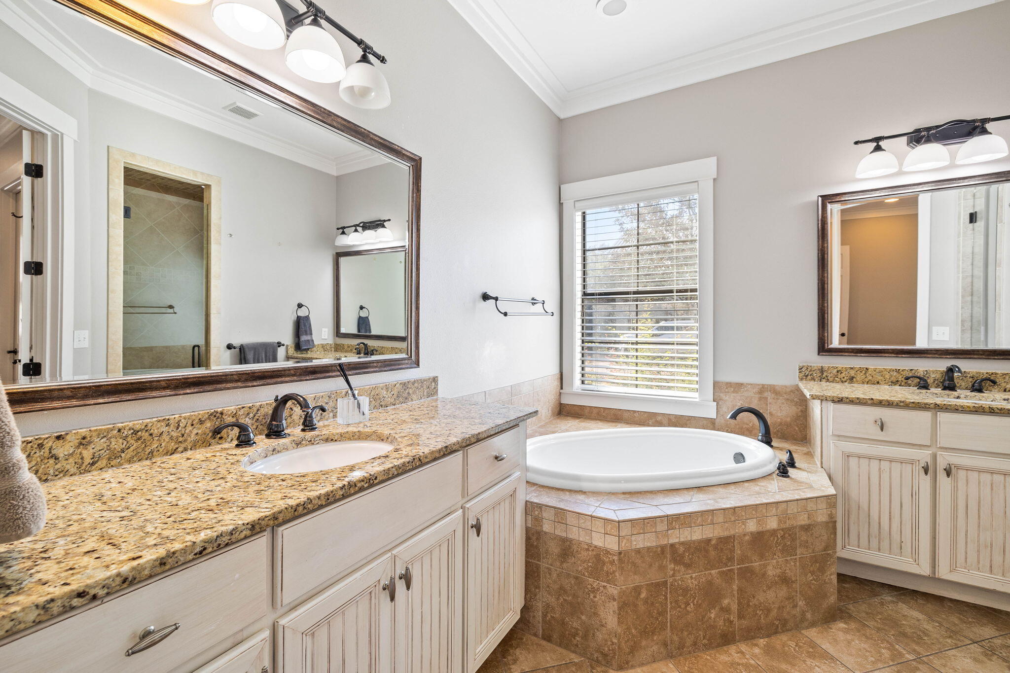 144 Preston Path Santa Rosa Beach, FL 32459 - Photo 46 of 60 a bathroom with a granite countertop tub sink and mirror