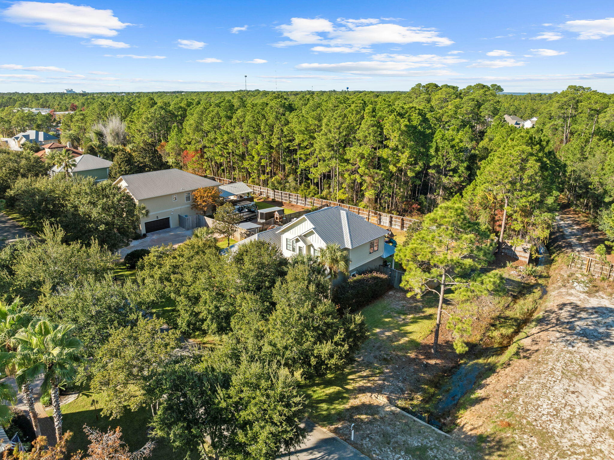 144 Preston Path Santa Rosa Beach, FL 32459 - Photo 5 of 60 a view of a lake with a house in the background