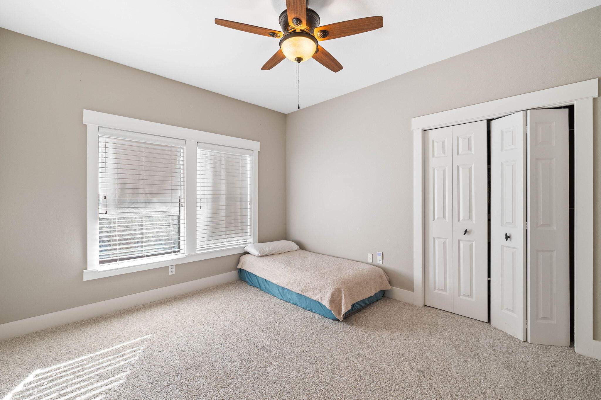 144 Preston Path Santa Rosa Beach, FL 32459 - Photo 51 of 60 a spacious bedroom with a bed and a chandelier