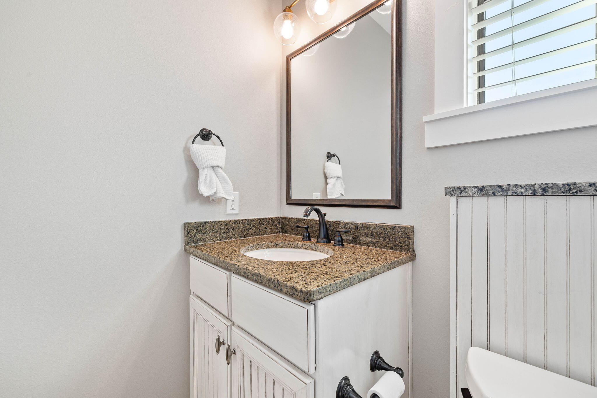 144 Preston Path Santa Rosa Beach, FL 32459 - Photo 55 of 60 a bathroom with a granite countertop sink and a mirror