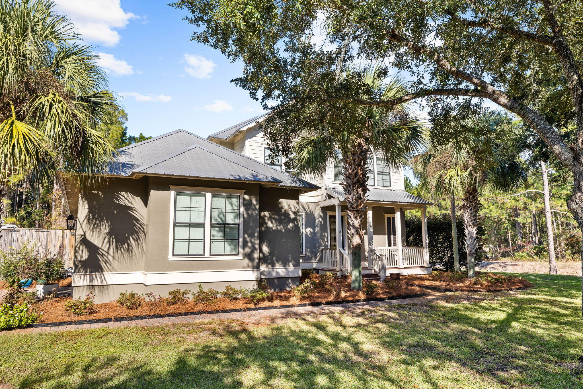 144 Preston Path Santa Rosa Beach, FL 32459 - Photo 8 of 60 a front view of a house with a tree