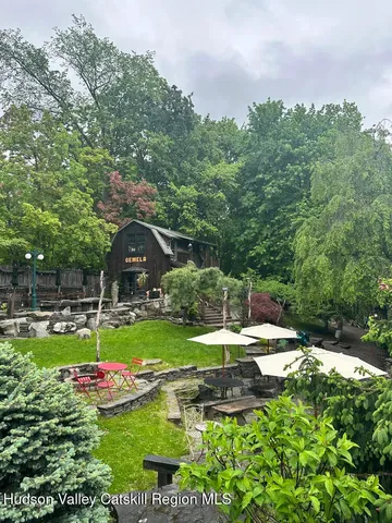 a view of a park with large trees