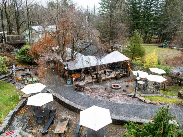 an aerial view of a house with garden