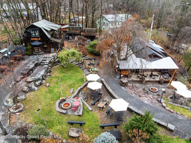 a view of a chairs and tables in patio