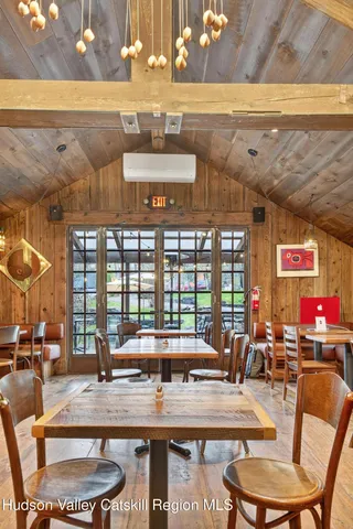 a view of a dining room with furniture