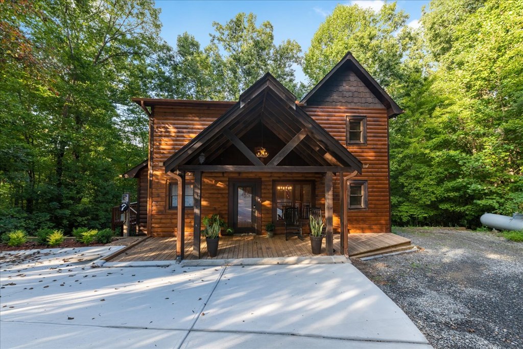126 Brookwood Drive Blue Ridge, GA 30513 - Photo 23 of 106 a front view of a house with a yard