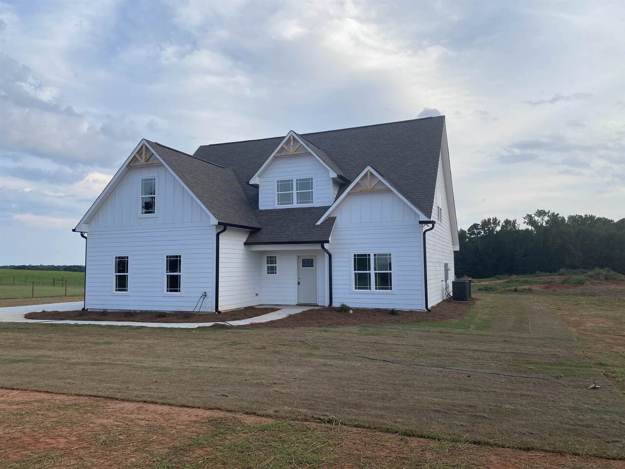 976 Rehoboth Church Road Griffin, GA 30224 - Photo 1 of 1 a view of a house with a yard