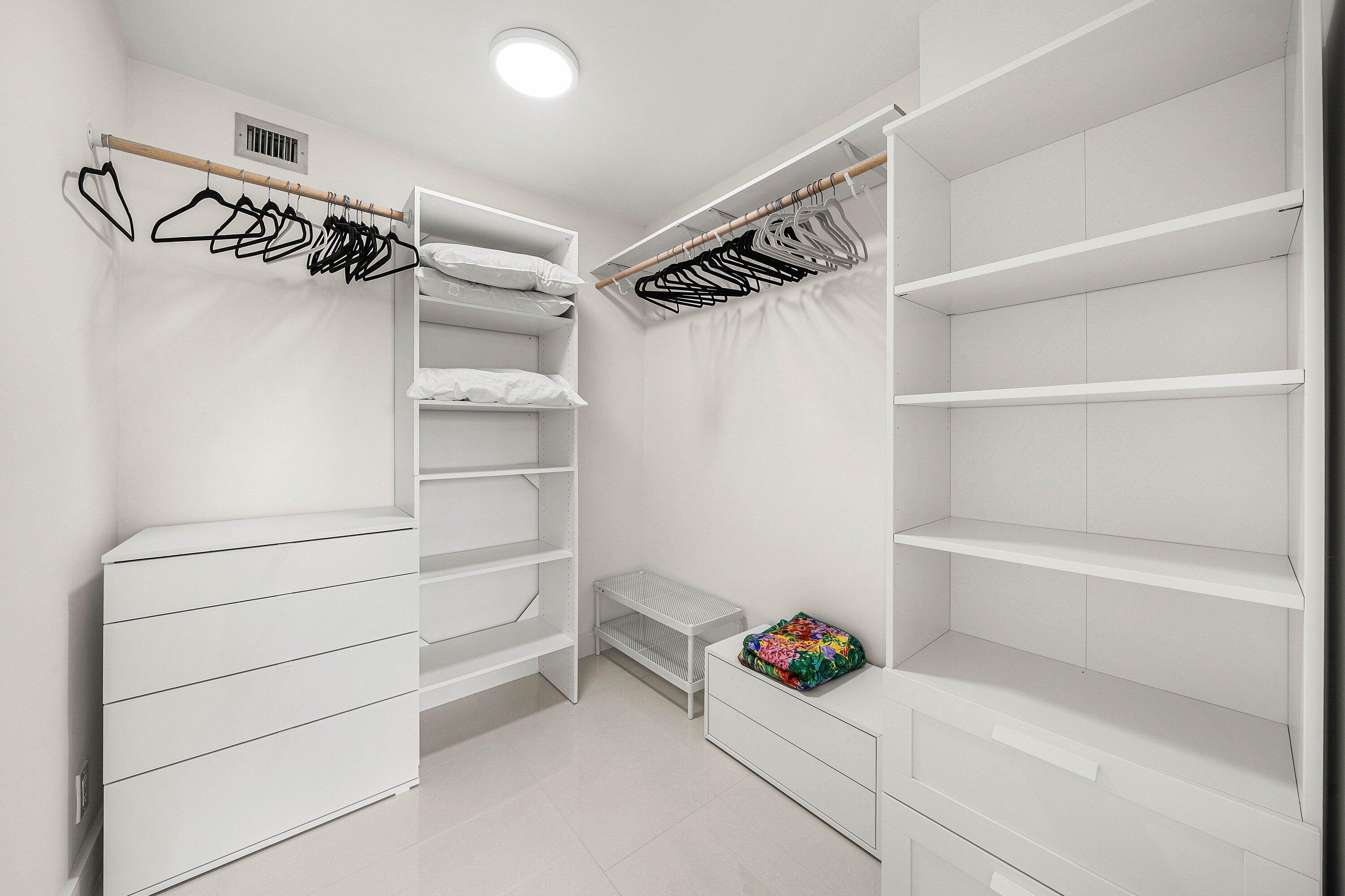 7145 Promenade Drive, Unit 101 Boca Raton, FL 33433 - Photo 20 of 35 a view of an empty walk in closet