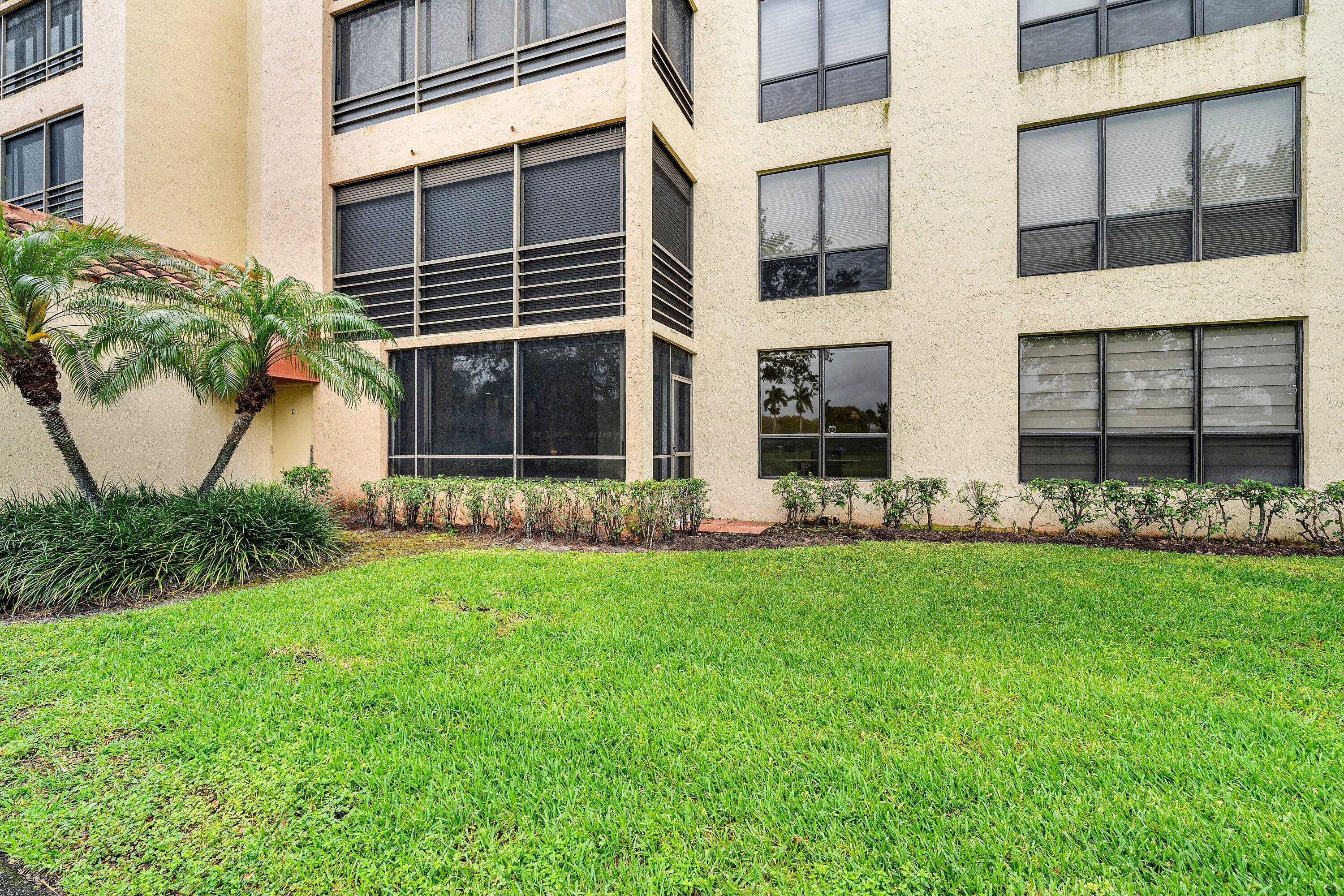 7145 Promenade Drive, Unit 101 Boca Raton, FL 33433 - Photo 30 of 35 a view of a back yard