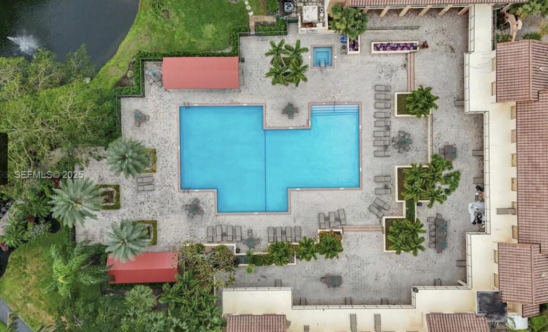 7145 Promenade Drive, Unit 101 Boca Raton, FL 33433 - Photo 33 of 35 an aerial view of a house with a garden