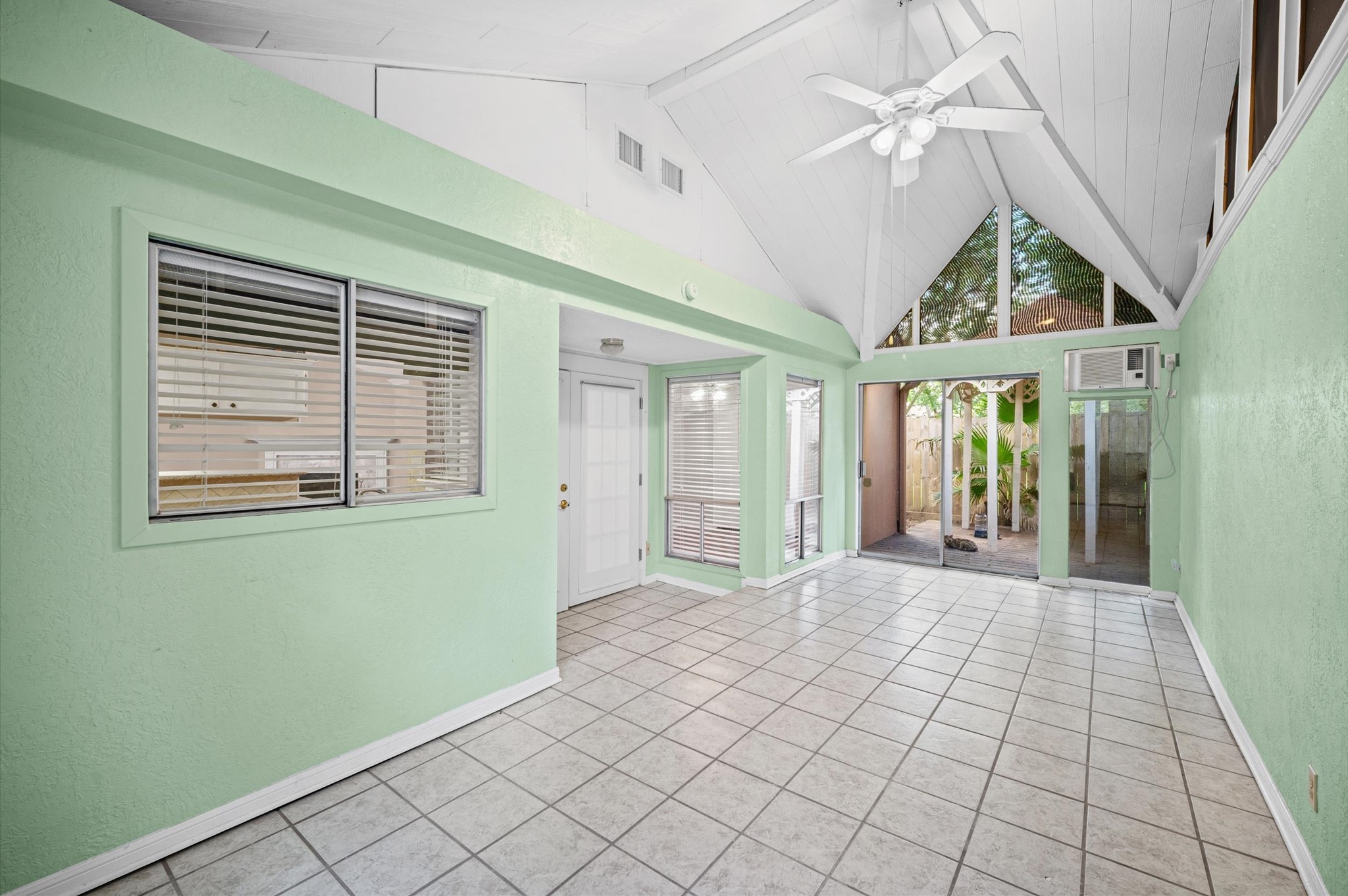 6903 Bullinger Drive Spring, TX 77379 - Photo 22 of 27 Sunroom attached with doors leading to backyard & front deck