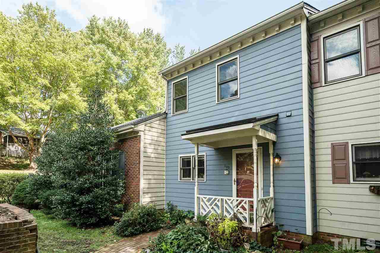 403 Danforth Drive Cary, NC 27511 - Photo 1 of 25 a front view of a house with plants
