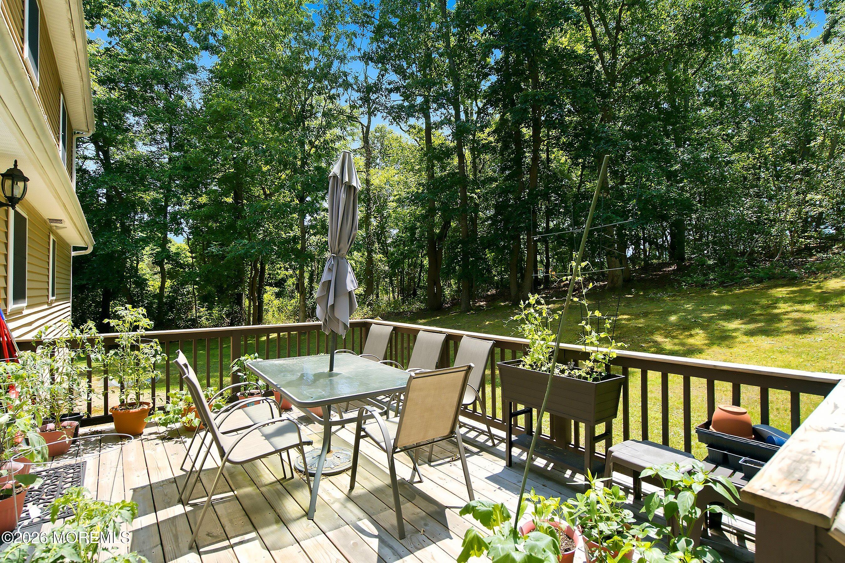 935 Bethel Church Road Jackson, NJ 08527 - Photo 28 of 32 a view of a chairs and table in the patio