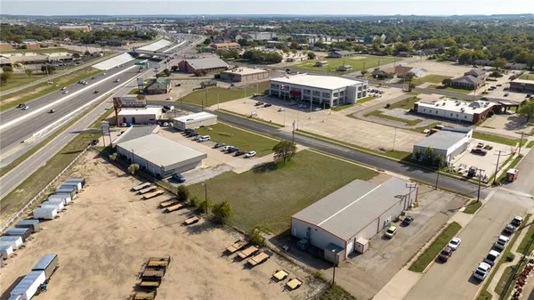 an aerial view of a city with lots of residential buildings