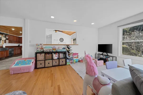 a view of a living room and a flat screen tv