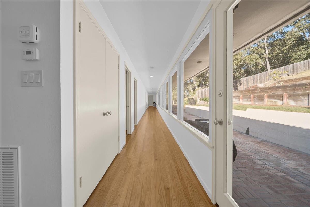 70 Corral De Tierra Road Salinas, CA 93908 - Photo 21 of 55 a view of a hallway with wooden floor and staircase