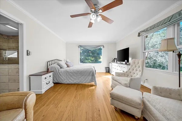 a bedroom with a bed and a fireplace