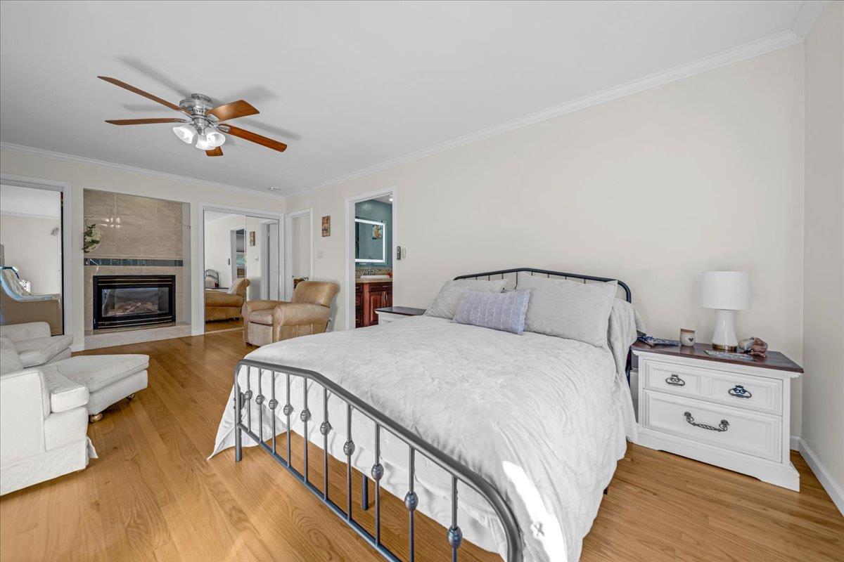 70 Corral De Tierra Road Salinas, CA 93908 - Photo 26 of 55 a bedroom with a bed and a fireplace