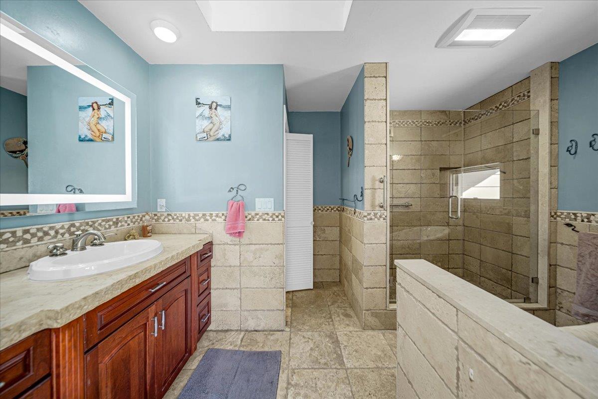 70 Corral De Tierra Road Salinas, CA 93908 - Photo 28 of 55 a bathroom with a sink a toilet and shower