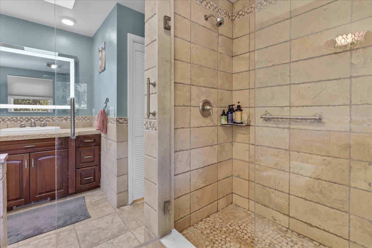 70 Corral De Tierra Road Salinas, CA 93908 - Photo 32 of 55 a bathroom with a sink and a shower