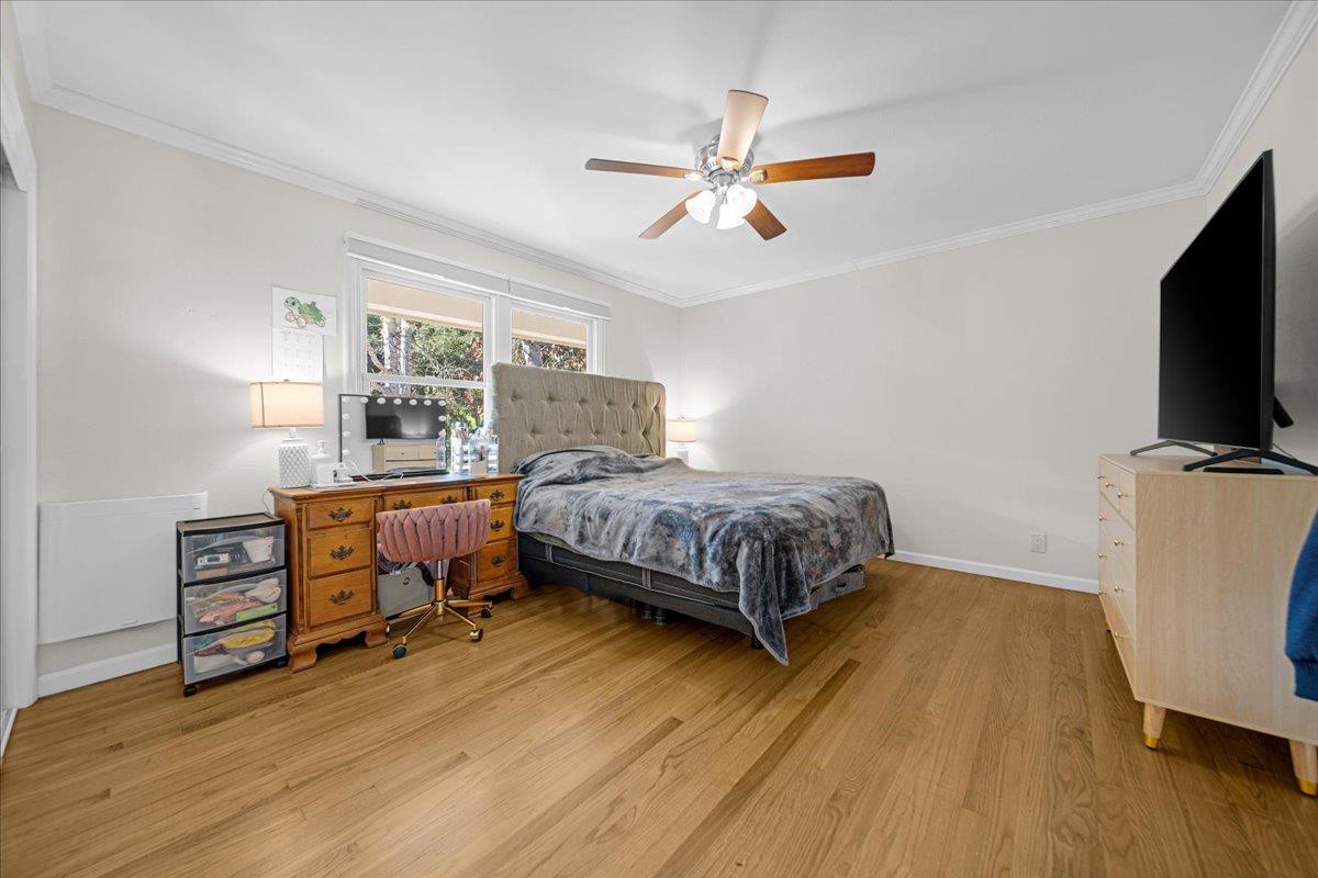 70 Corral De Tierra Road Salinas, CA 93908 - Photo 33 of 55 a bedroom with a bed and wooden floor