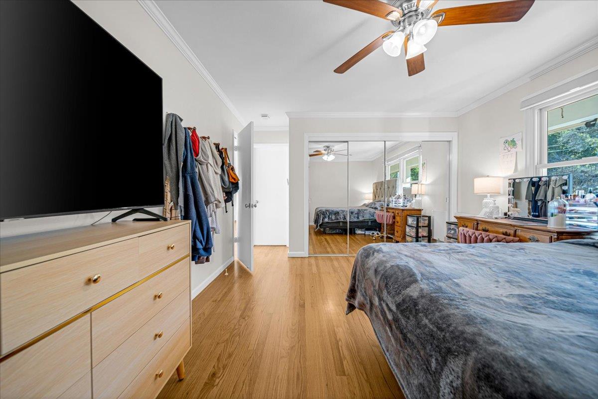 70 Corral De Tierra Road Salinas, CA 93908 - Photo 34 of 55 a bedroom with a bed and a flat tv screen on dresser