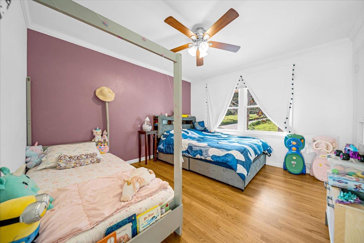 70 Corral De Tierra Road Salinas, CA 93908 - Photo 39 of 55 a bedroom with a bed and a chandelier