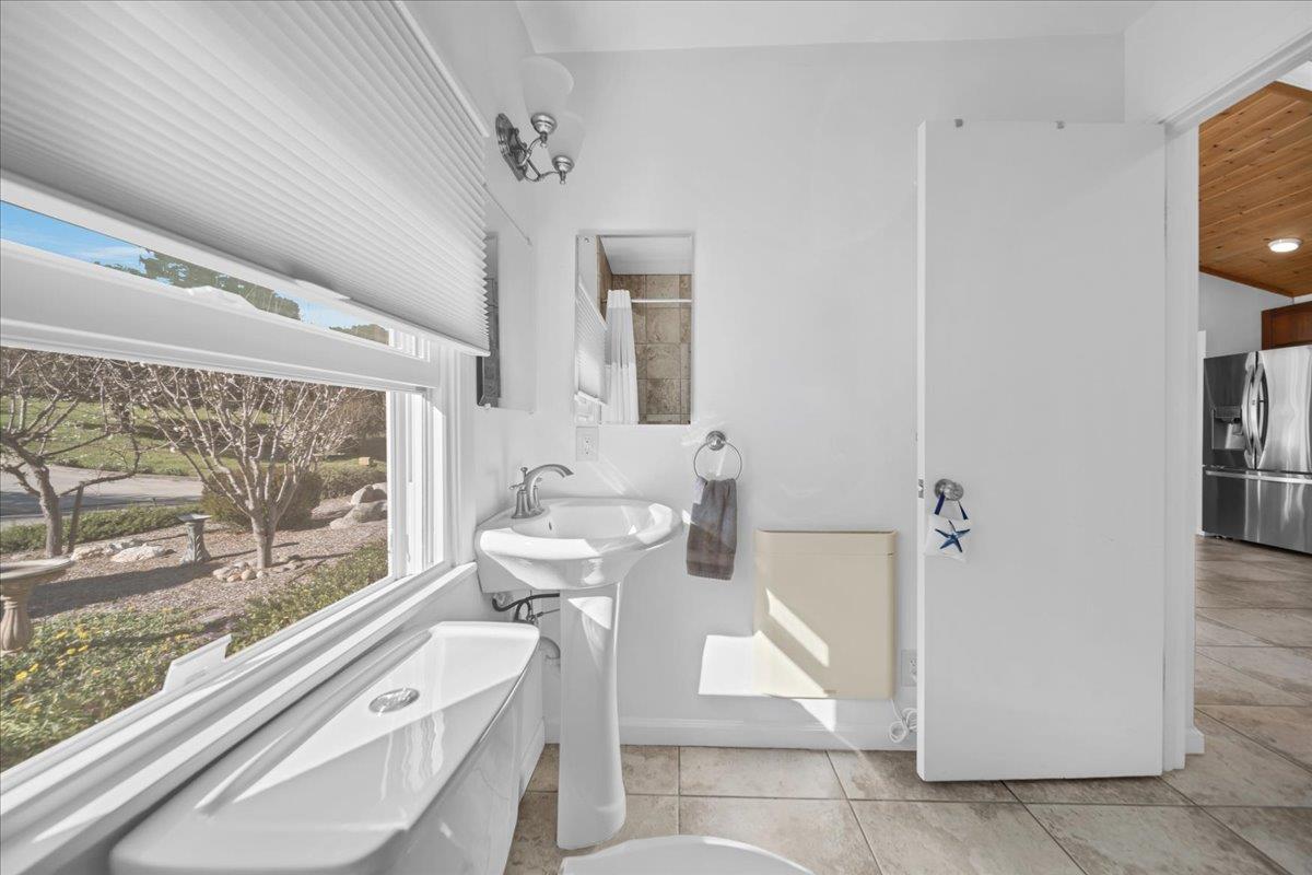 70 Corral De Tierra Road Salinas, CA 93908 - Photo 42 of 55 a bathroom with a sink a toilet and shower