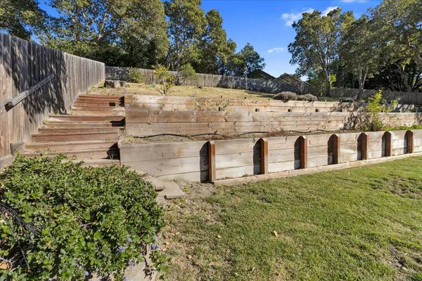 a backyard of a house with lots of green space