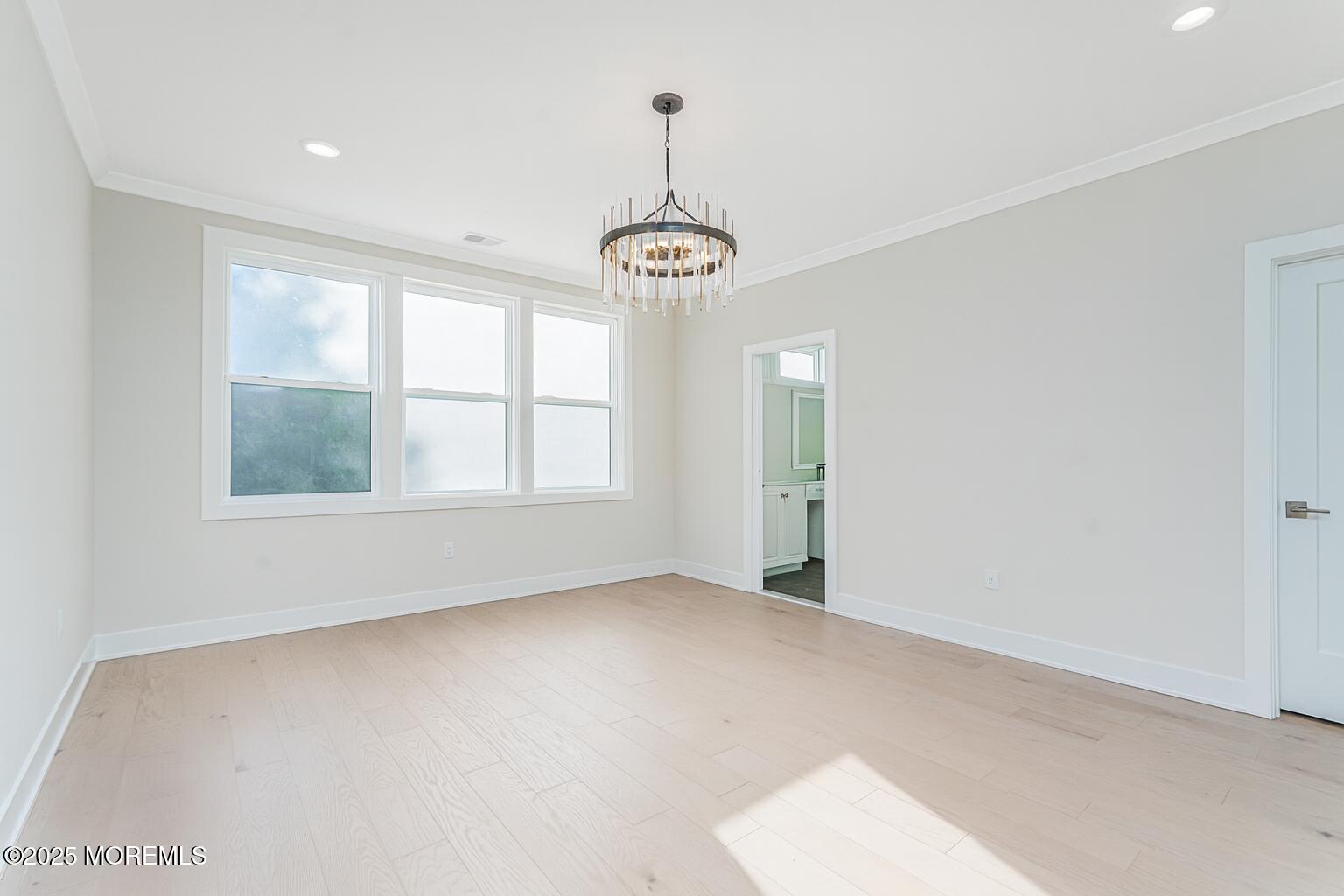 22 Edmund Way Middletown, NJ 07748 - Photo 11 of 49 a view of an empty room with windows
