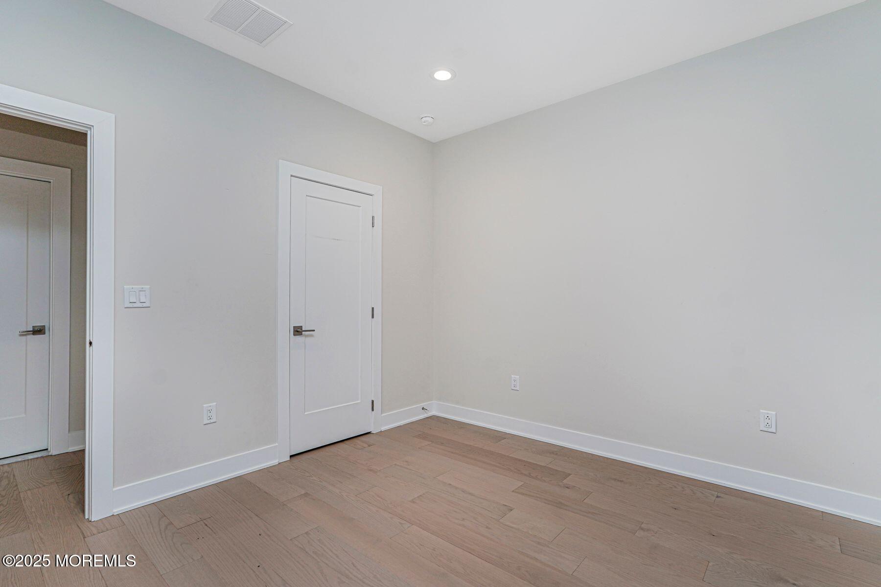 22 Edmund Way Middletown, NJ 07748 - Photo 37 of 49 a view of an empty room