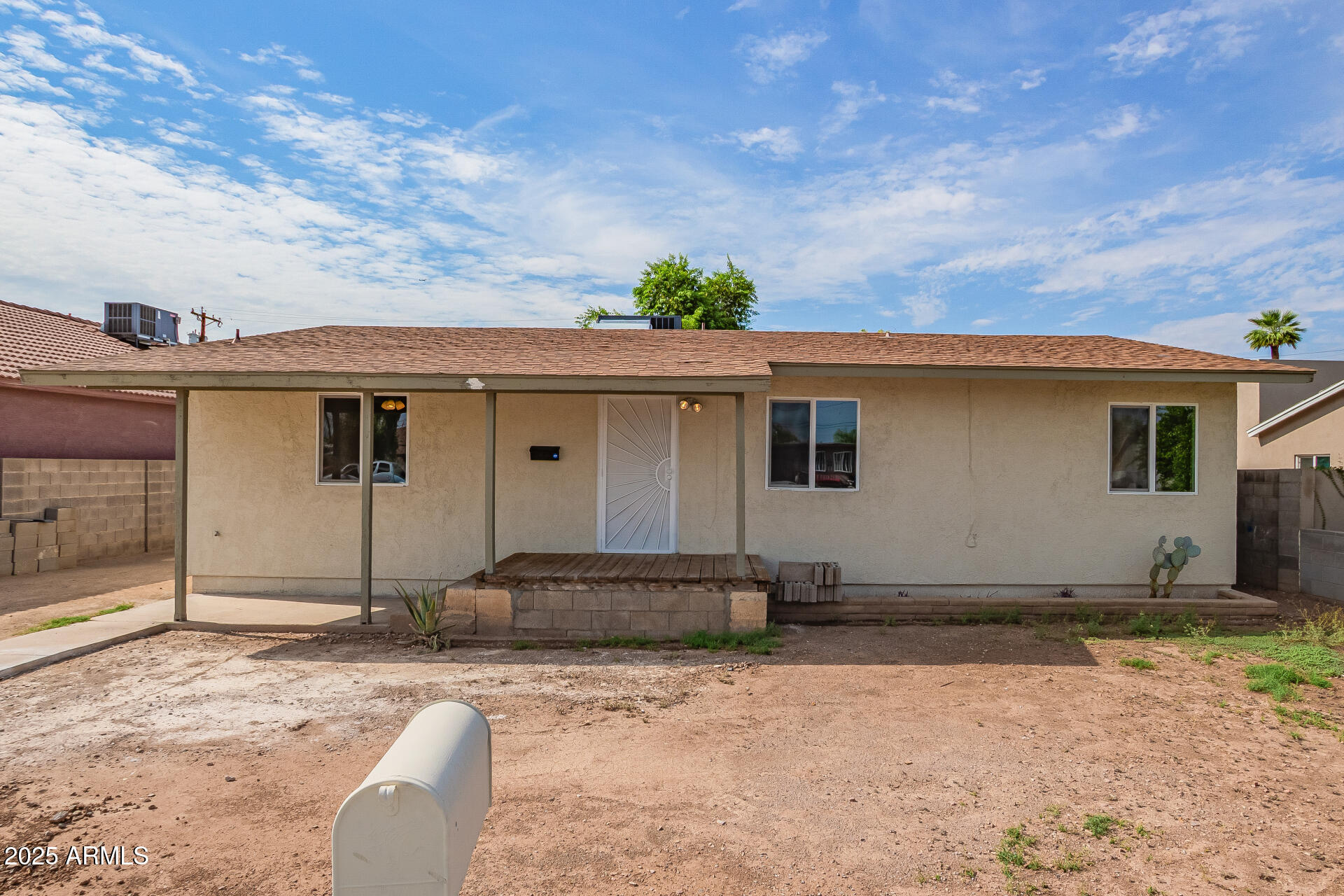 3527 West Almeria Road Phoenix, AZ 85009 - Photo 2 of 32 front view of a house