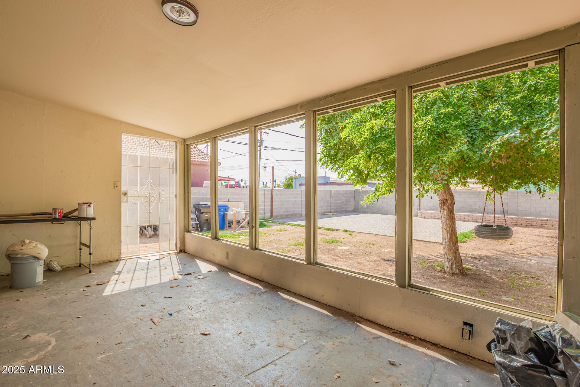 3527 West Almeria Road Phoenix, AZ 85009 - Photo 28 of 32 a very nice looking room with a large window