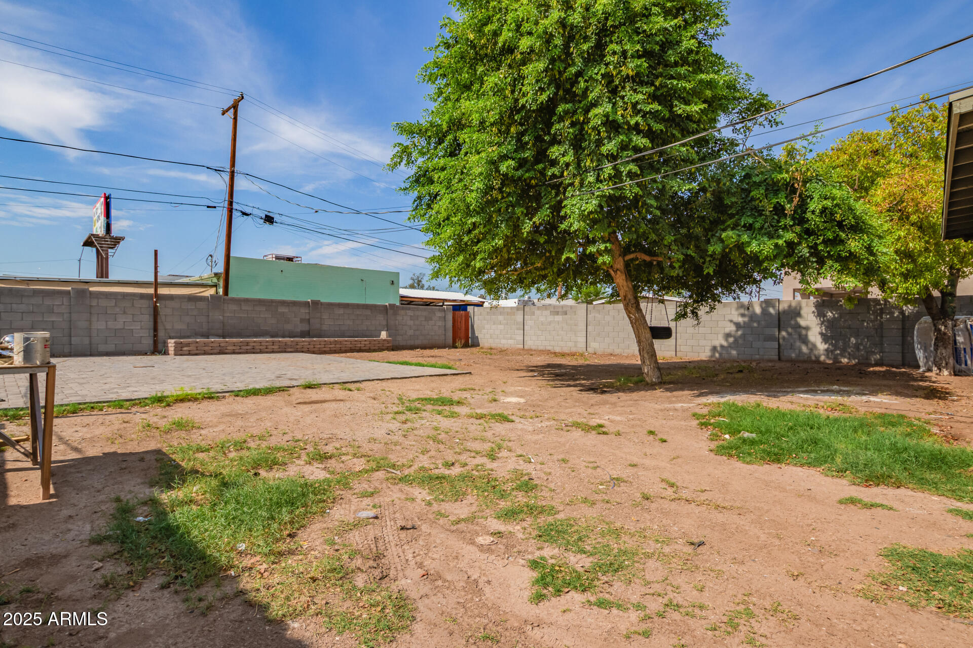 3527 West Almeria Road Phoenix, AZ 85009 - Photo 29 of 32 a view of a house with a yard