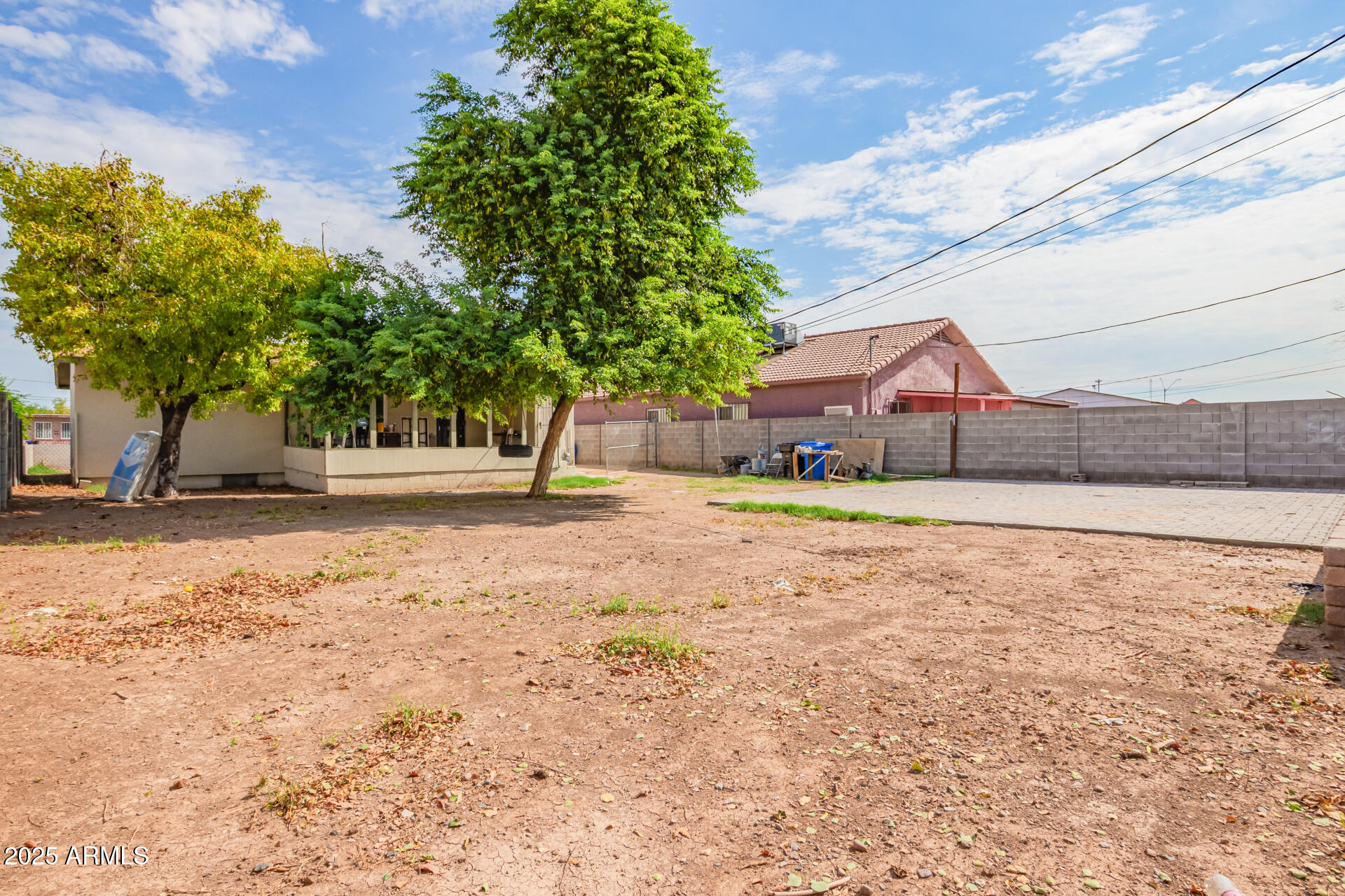3527 West Almeria Road Phoenix, AZ 85009 - Photo 31 of 32 a house with trees in front of it