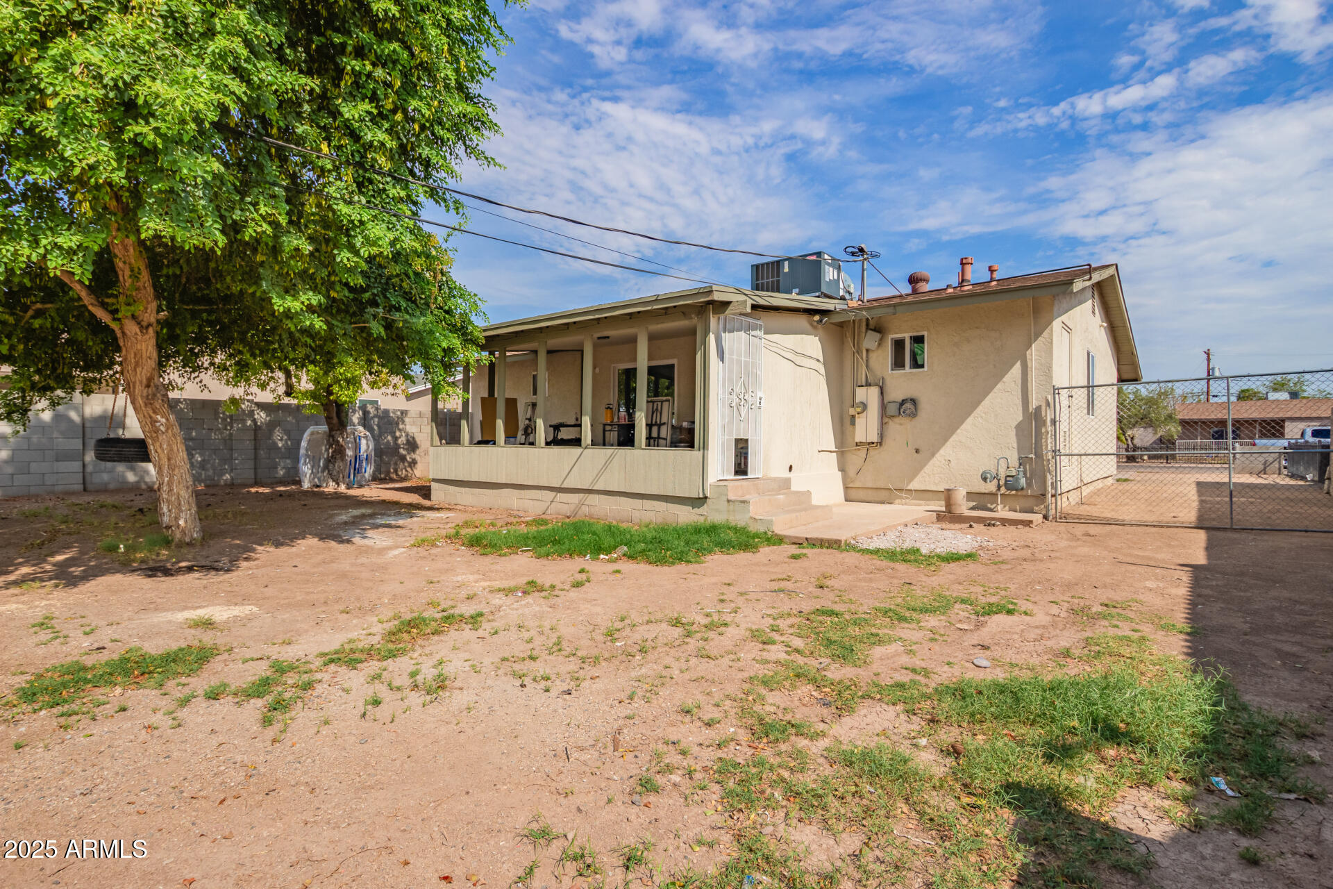 3527 West Almeria Road Phoenix, AZ 85009 - Photo 32 of 32 a view of a house with a yard