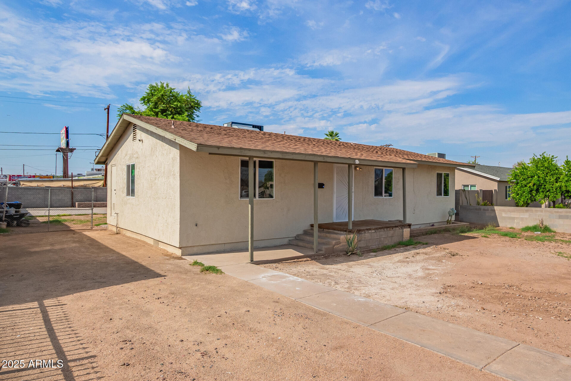 3527 West Almeria Road Phoenix, AZ 85009 - Photo 4 of 32 a view of a house with backyard and sitting area