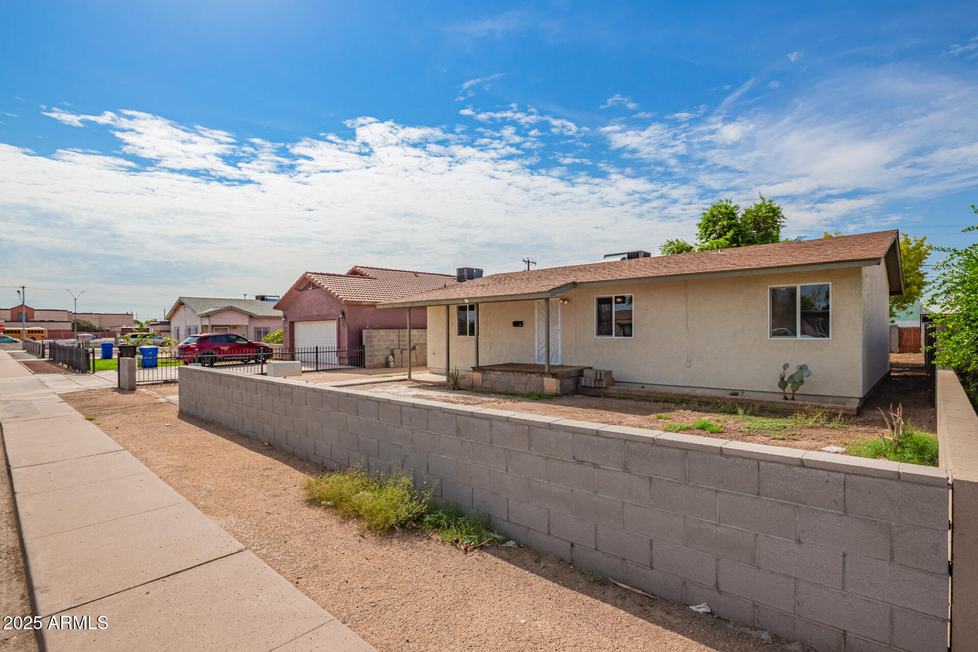 3527 West Almeria Road Phoenix, AZ 85009 - Photo 5 of 32 a view of house with outdoor space and sitting area