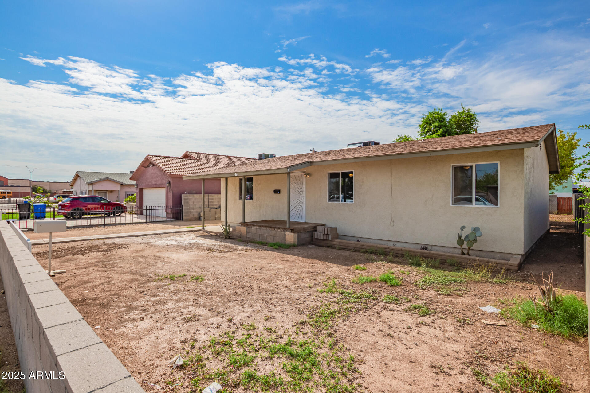 3527 West Almeria Road Phoenix, AZ 85009 - Photo 7 of 32 a view of a house with a patio