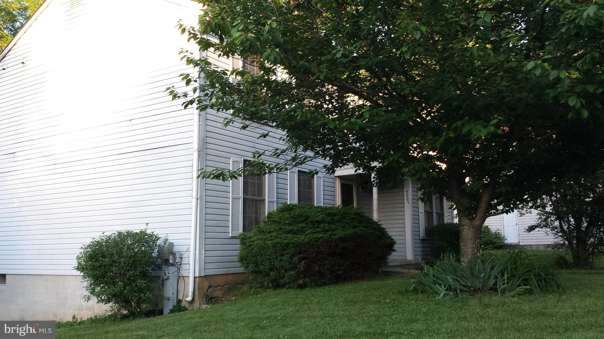 4607 Panacea Road Baltimore, MD 21208 - Photo 1 of 24 a view of a house with a yard
