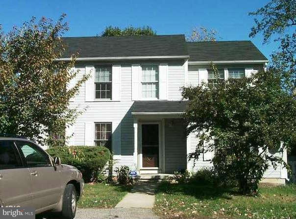 4607 Panacea Road Baltimore, MD 21208 - Photo 2 of 24 a front view of a house with a yard