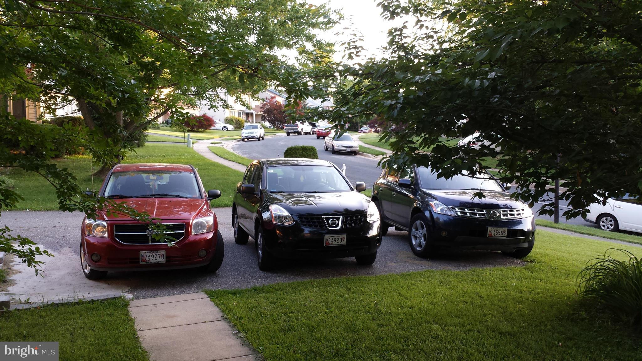 4607 Panacea Road Baltimore, MD 21208 - Photo 11 of 24 a couple of cars parked in a yard