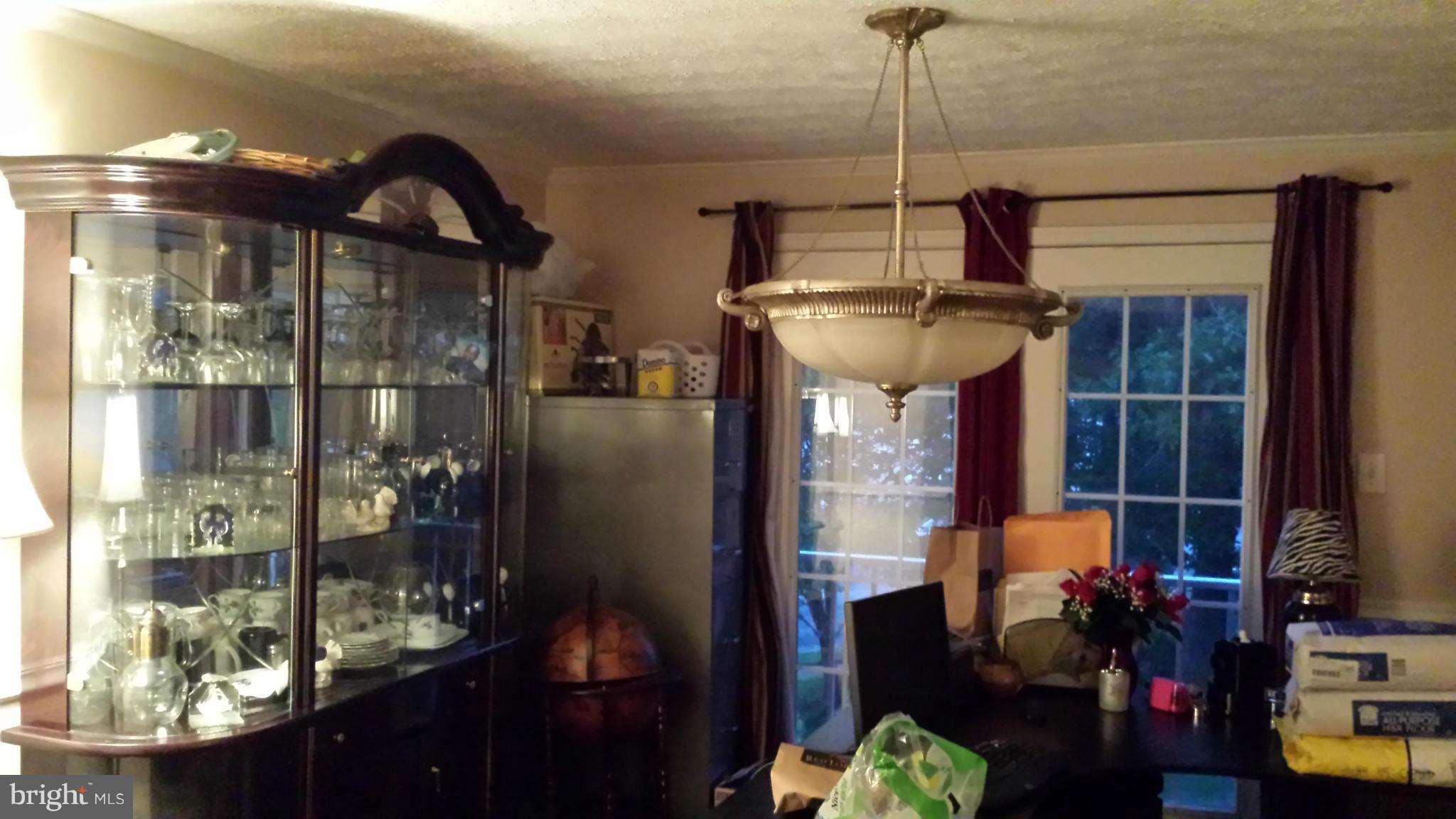 4607 Panacea Road Baltimore, MD 21208 - Photo 22 of 24 a room with musical instrument