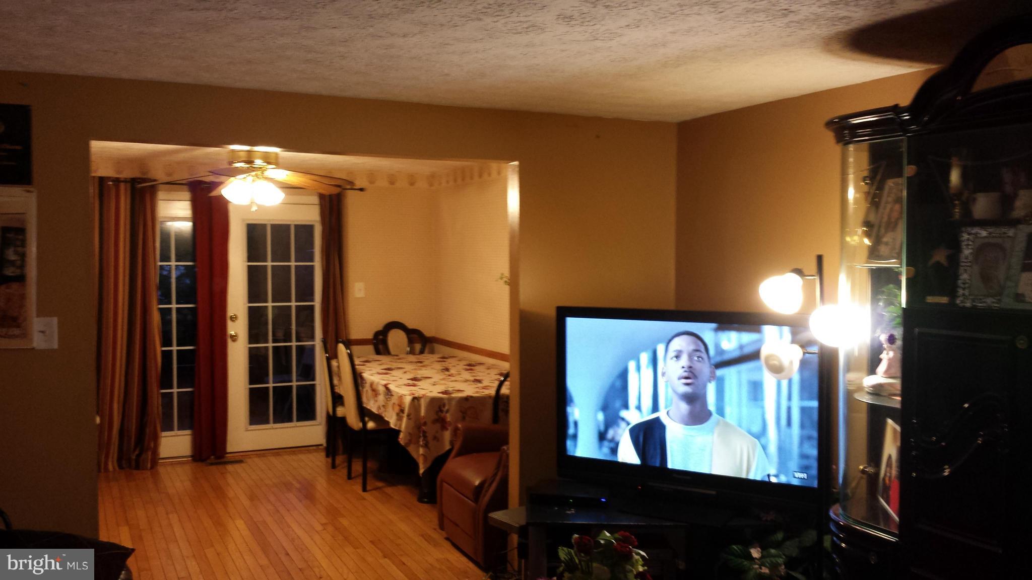 4607 Panacea Road Baltimore, MD 21208 - Photo 23 of 24 a view of a livingroom with furniture and window