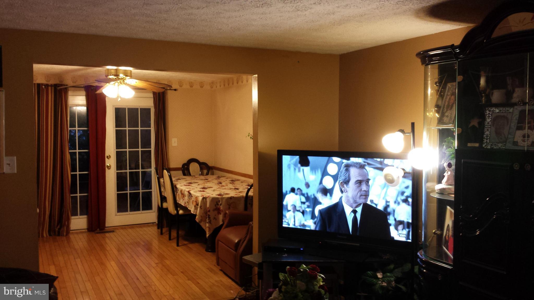 4607 Panacea Road Baltimore, MD 21208 - Photo 24 of 24 a view of a livingroom with furniture and window