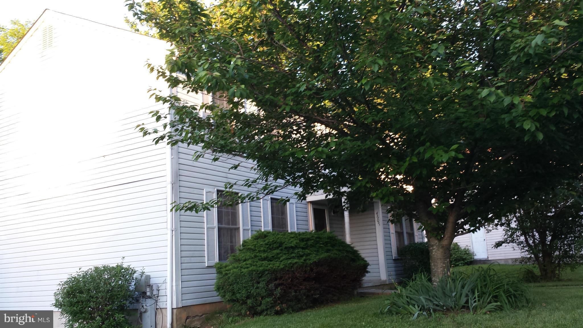 4607 Panacea Road Baltimore, MD 21208 - Photo 6 of 24 a front view of a house with garden