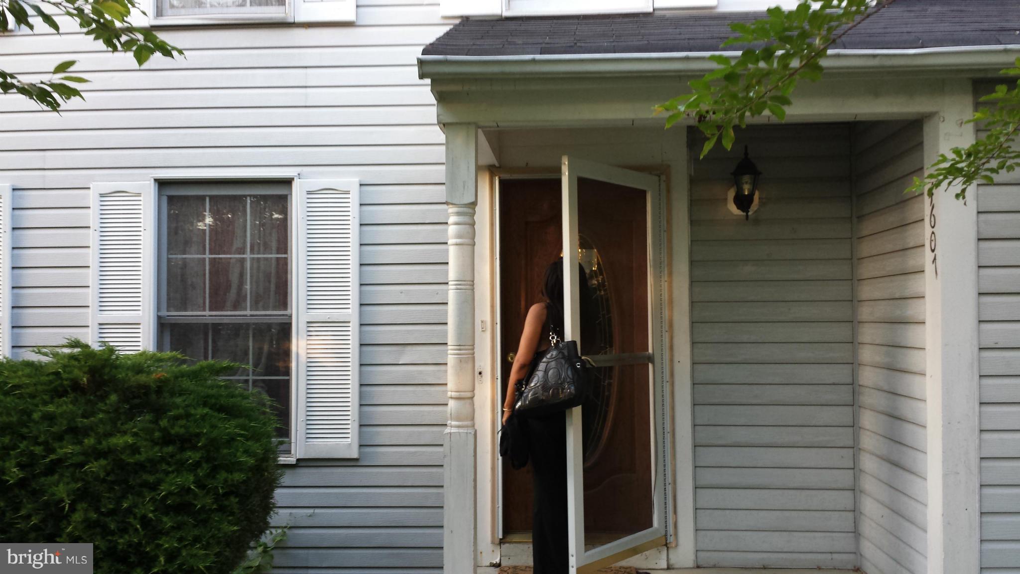 4607 Panacea Road Baltimore, MD 21208 - Photo 9 of 24 a view of a house with a potted plant and stairs