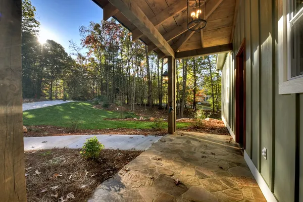 a view of a porch with a backyard