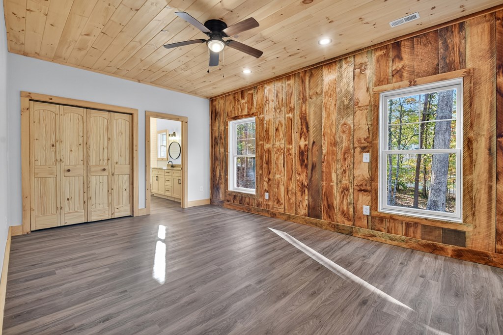 646 High Country Crossing Morganton, GA 30560 - Photo 29 of 44 an empty room with wooden floor and windows